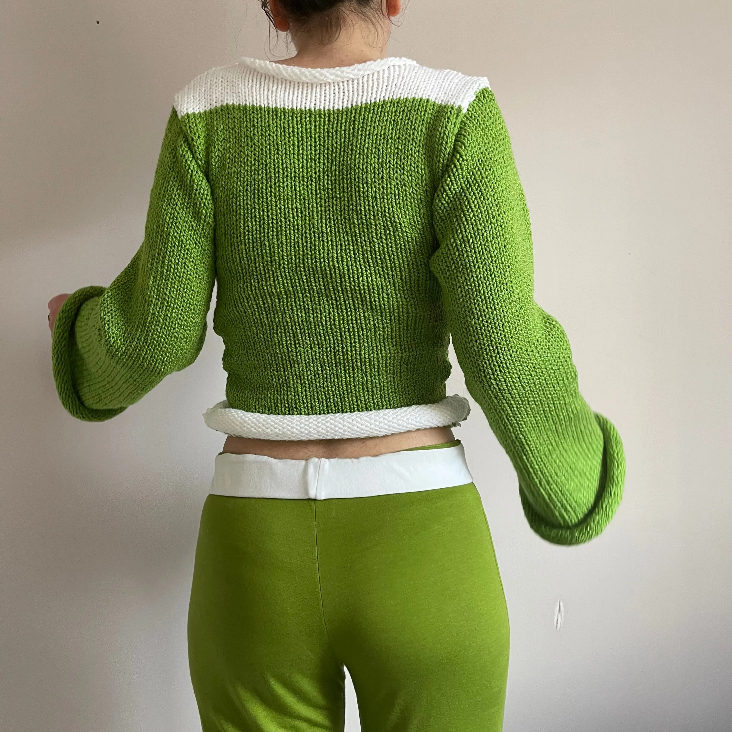 Handmade knitted colour block jumper in green and white