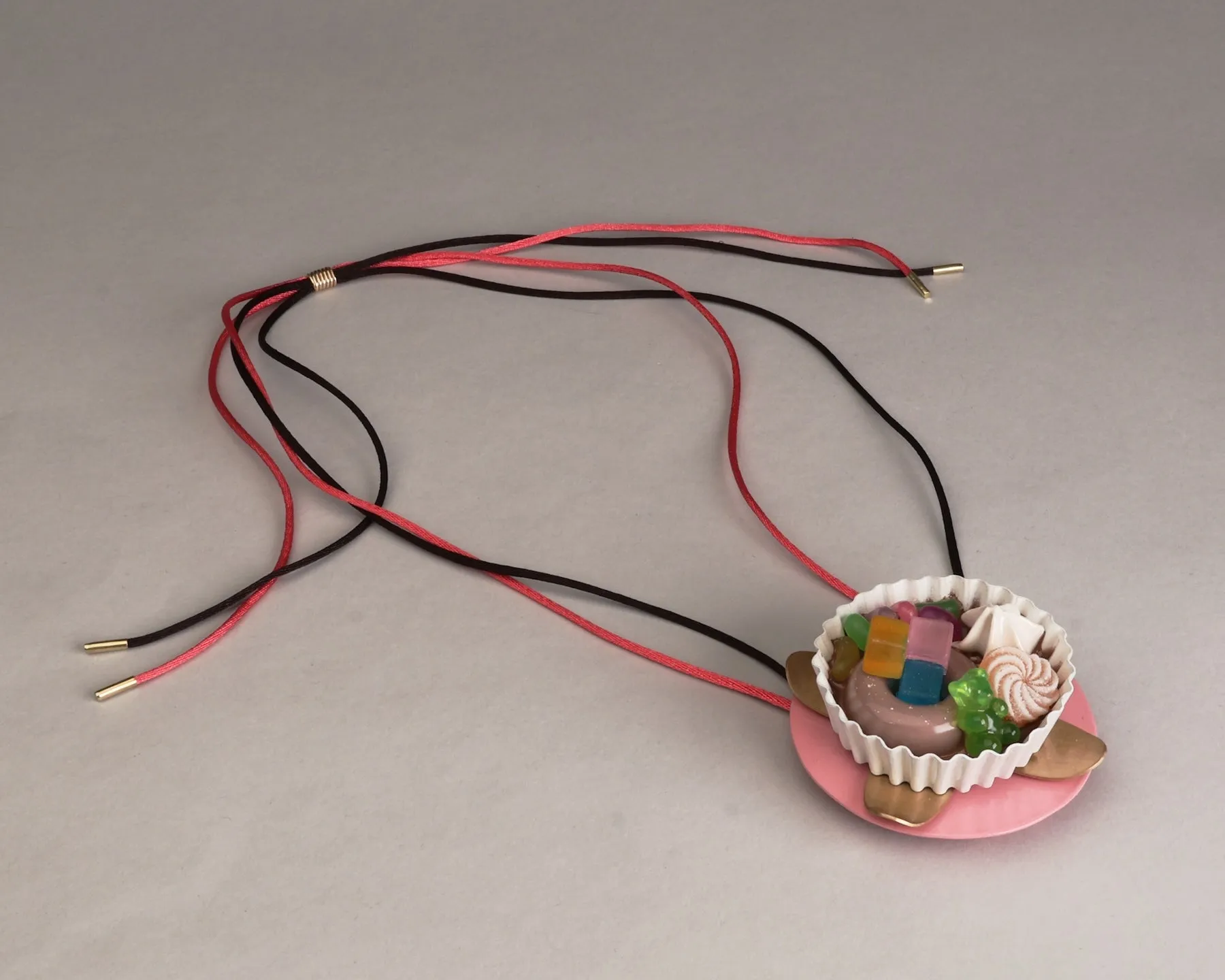 Spinning Necklace with Dessert Tray by Vanessa Shum